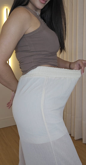 Calça Aladim Off-White feminina em crepe de seda com forro e amarração na barra
