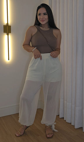 Calça Aladim Off-White feminina em crepe de seda com forro e amarração na barra